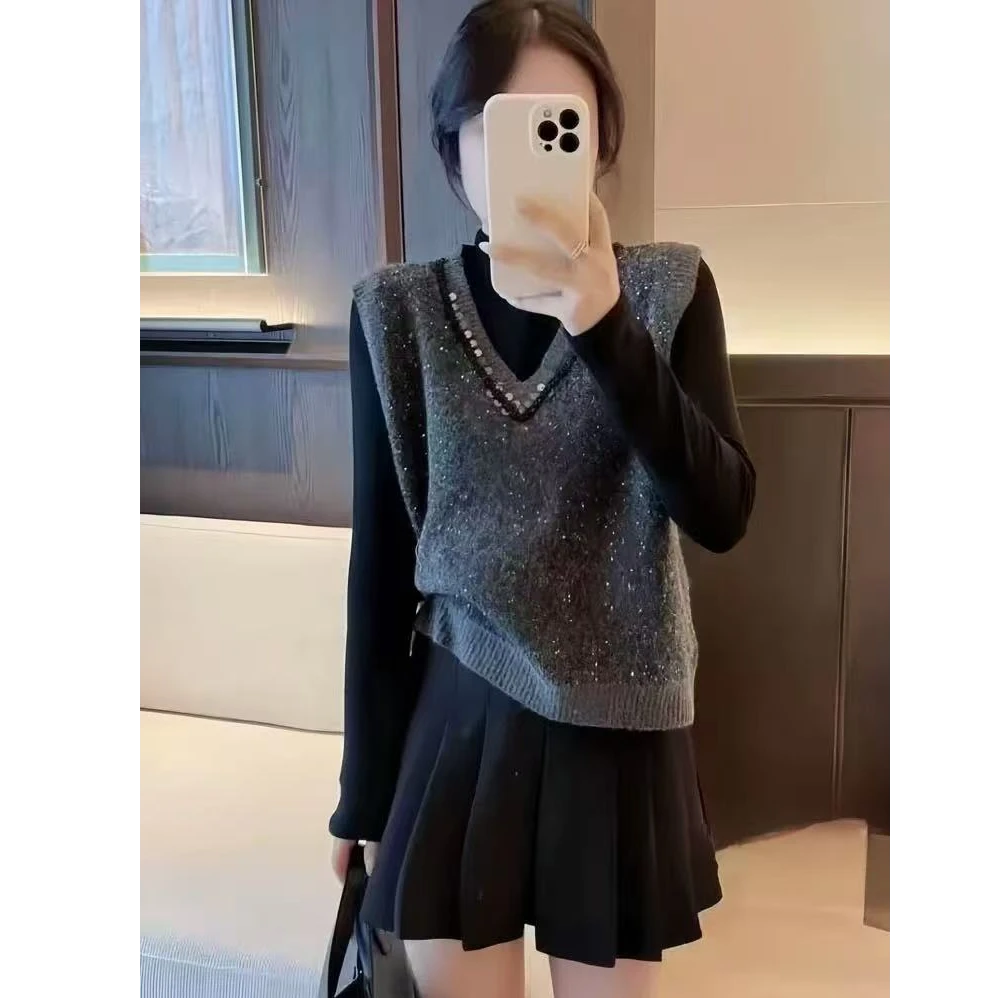 玲家精选02115款号时尚重工订铢针织马甲