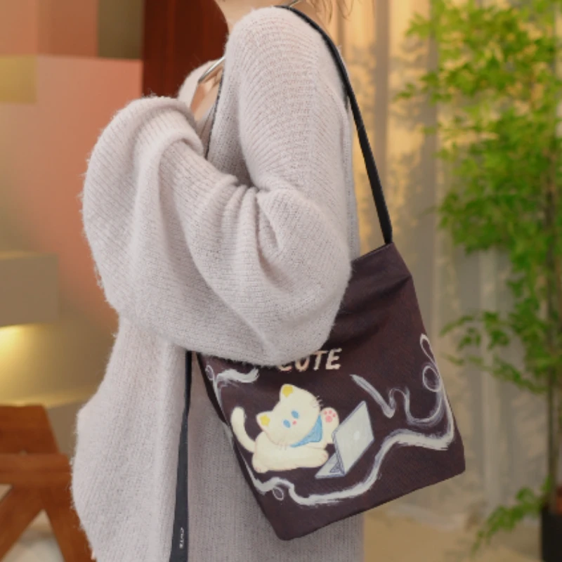 蜡笔猫咪单肩斜挎包包