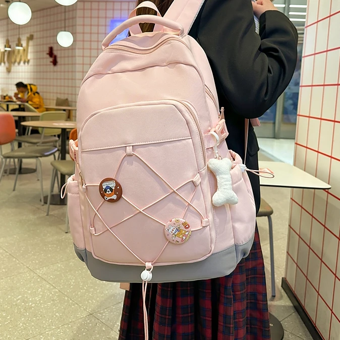 韩版初中生书包女时尚百搭双肩包高中大学生轻便大容量休闲背包