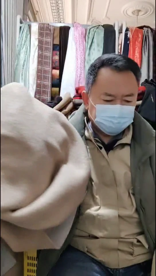 麦驼色纯色双色针织布料