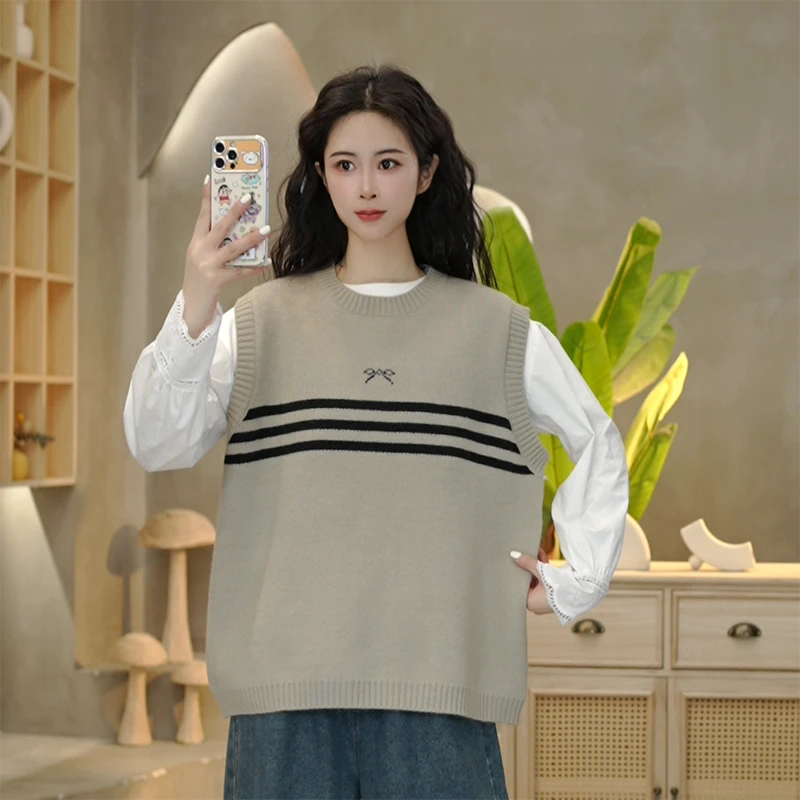 5181 春季新款时尚韩版设计感撞色蝴蝶结条纹针织马甲上衣