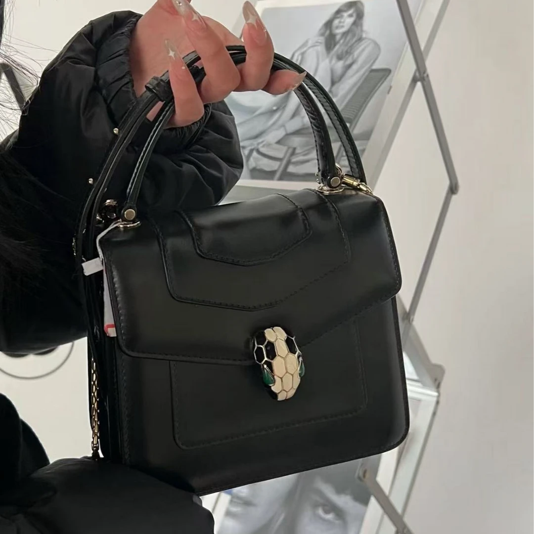 95新 BVLGARI/宝格丽 理里奢品/宝格丽黑色蛇头风琴包