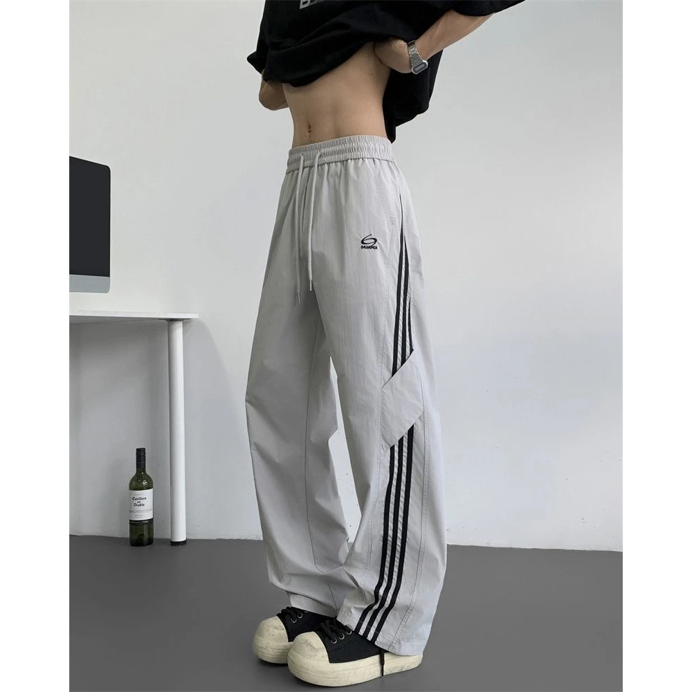 2025夏季爆款冰丝速干休闲裤男生户外运动拼接条纹痞帅宽松直筒裤