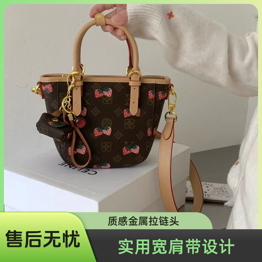 优库迪斯UK女包2025新款时尚印花菜篮子2025年网红流行款包包