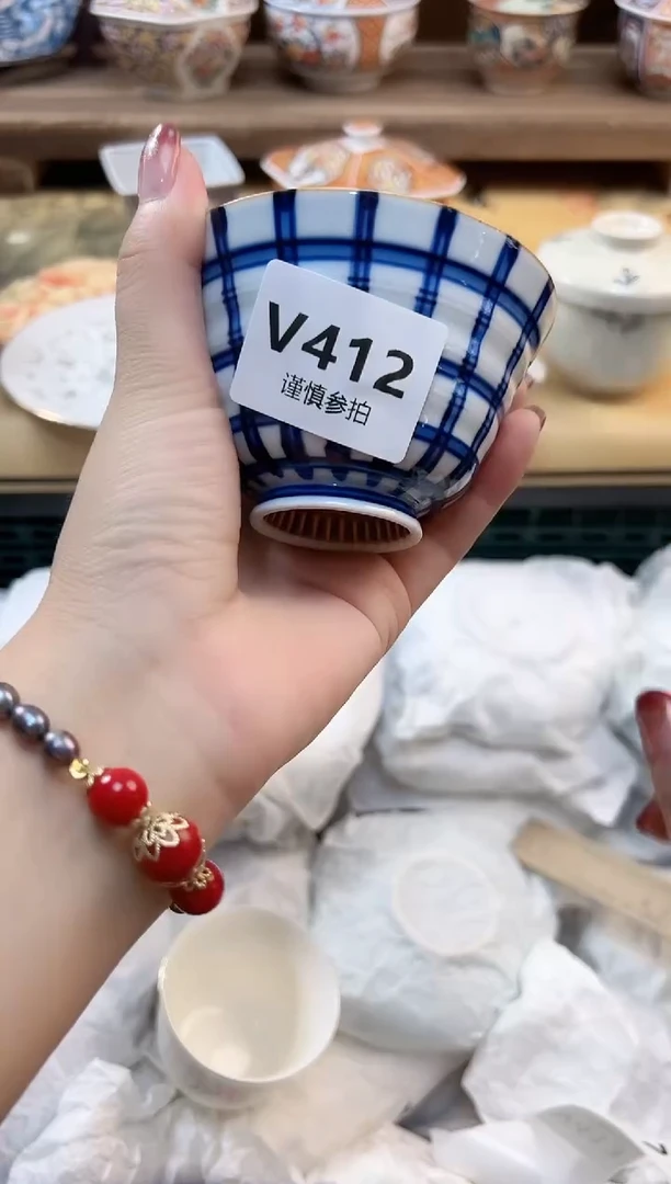 瓷片吴**谓        412