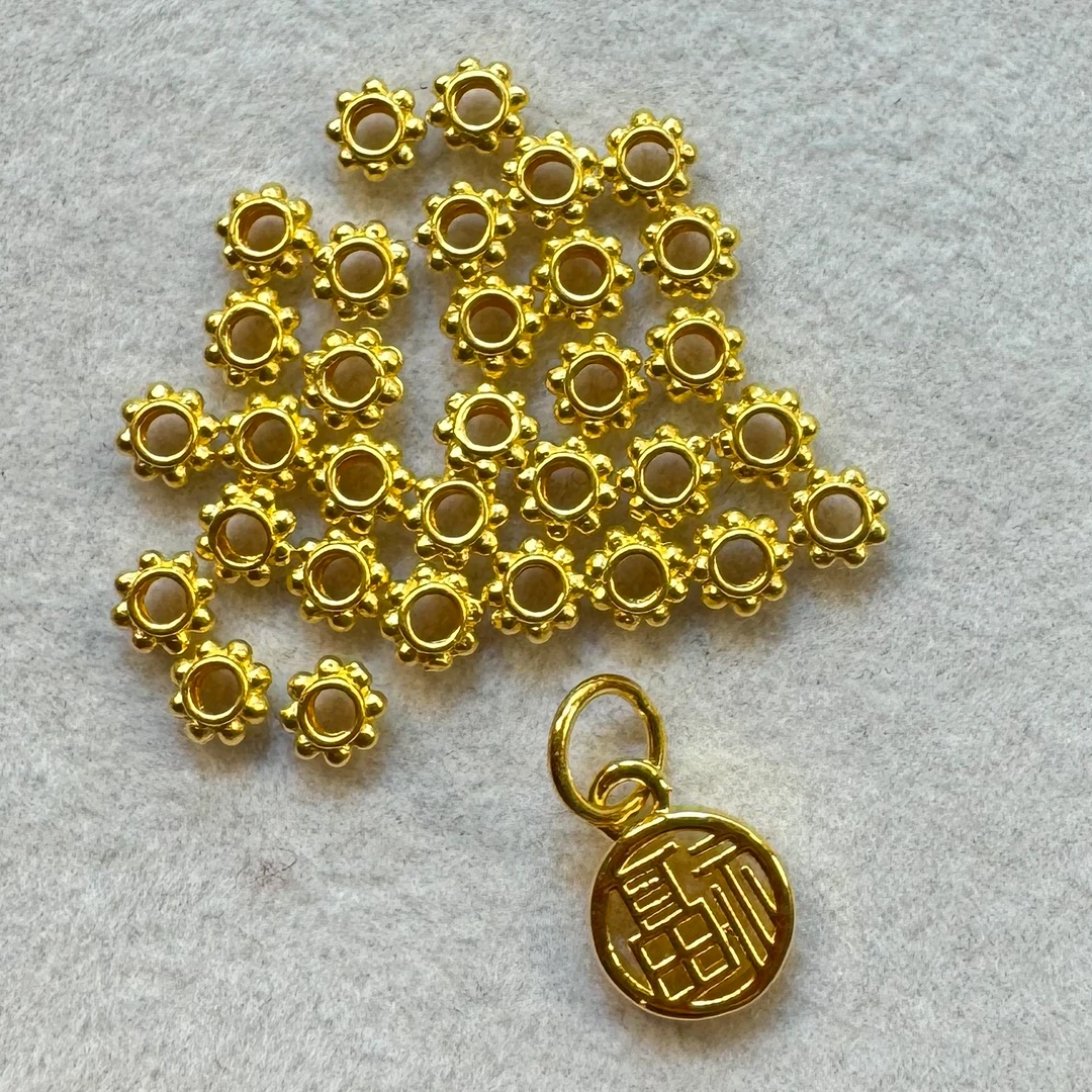 水贝东翊饰集足金999雪花隔片+福牌配件