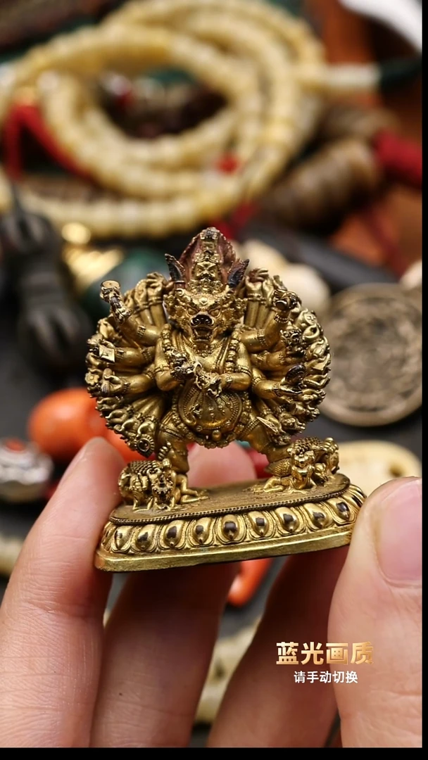 铜鎏金多手姿老造像