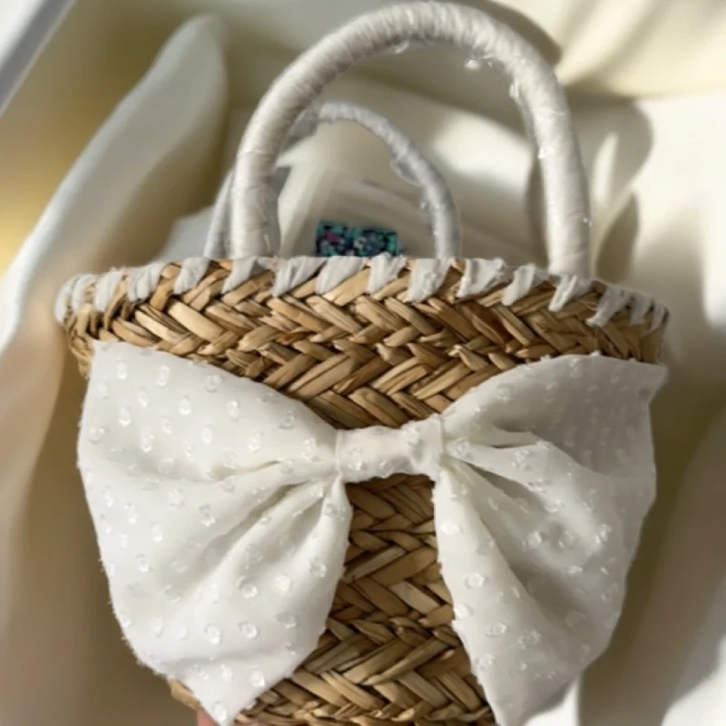 蝴蝶结草编包可爱萝莉手工编织二次元搭配