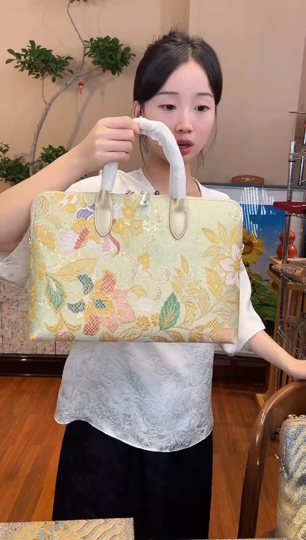 刺绣柠***?非遗唐锦包包