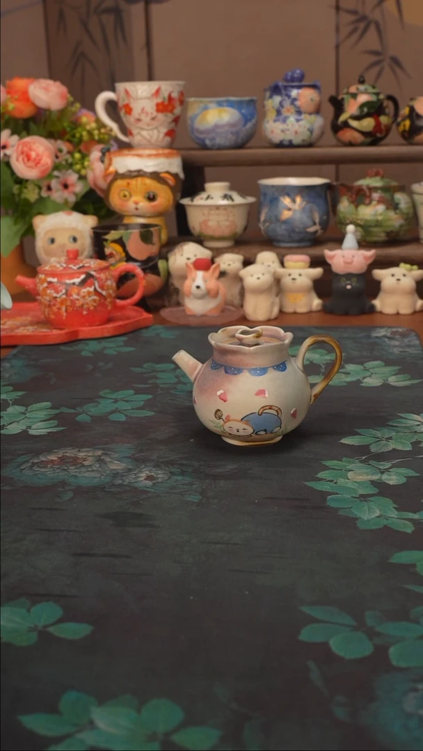 李辉熠    喵趣壶