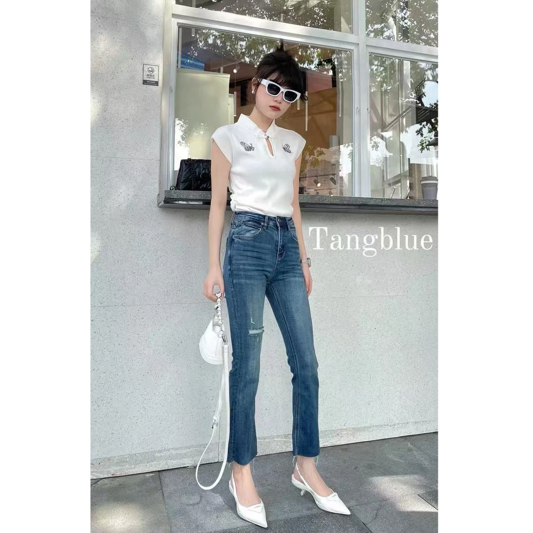 867妙玲品牌牛仔裤女磨破蓝色毛边九分微喇牛仔裤女春秋新款