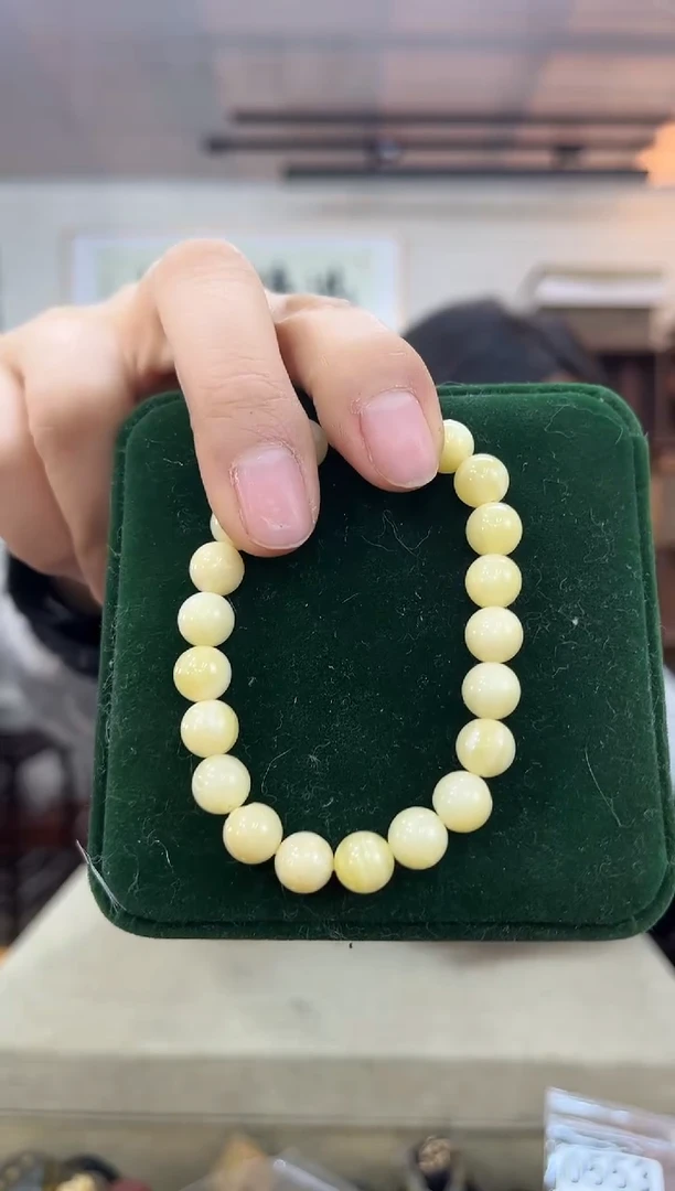 【闪购商品】木0557木木塑料全黄0.8单圈+两颗珠子