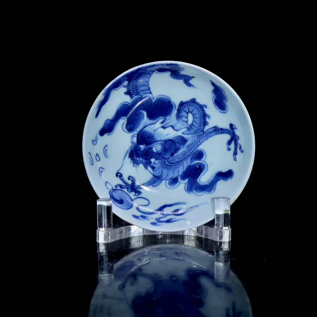 61: 清雍正青花过墙龙纹盘