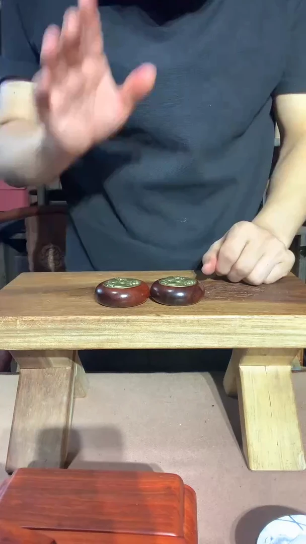 木紫檀牛转乾坤手把件一对