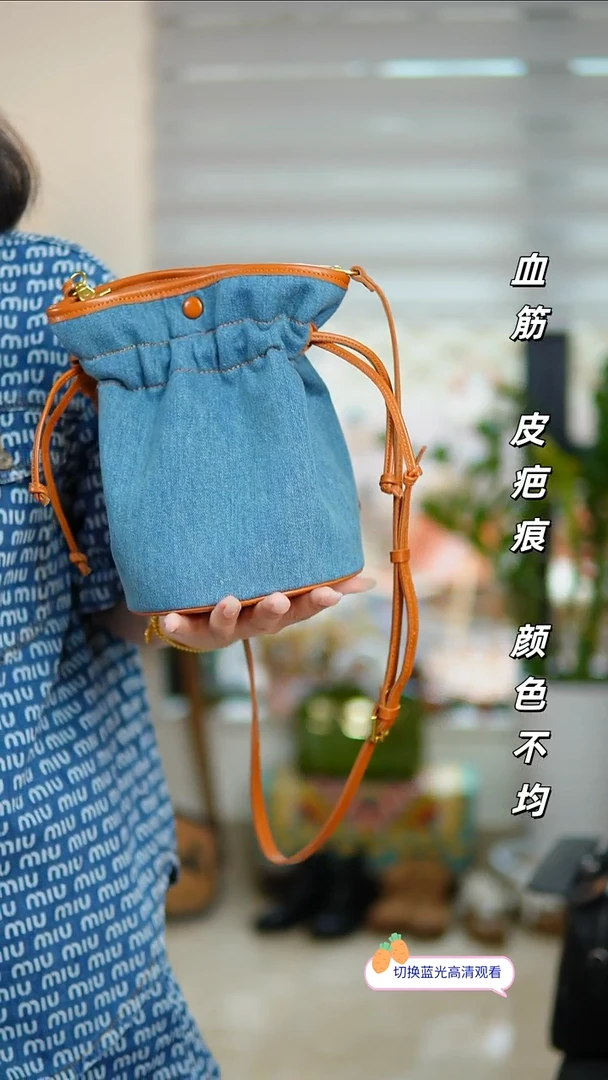 真皮不退换！浅蓝色水桶包