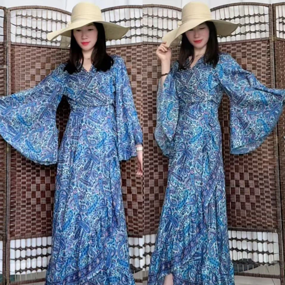 卡雅波西米亚度假风大喇叭袖荷叶边裹身裙慵懒风长连衣裙