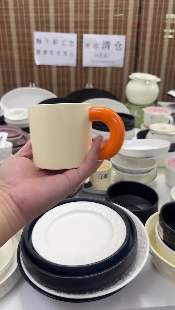 瓷黄色手柄杯子1个