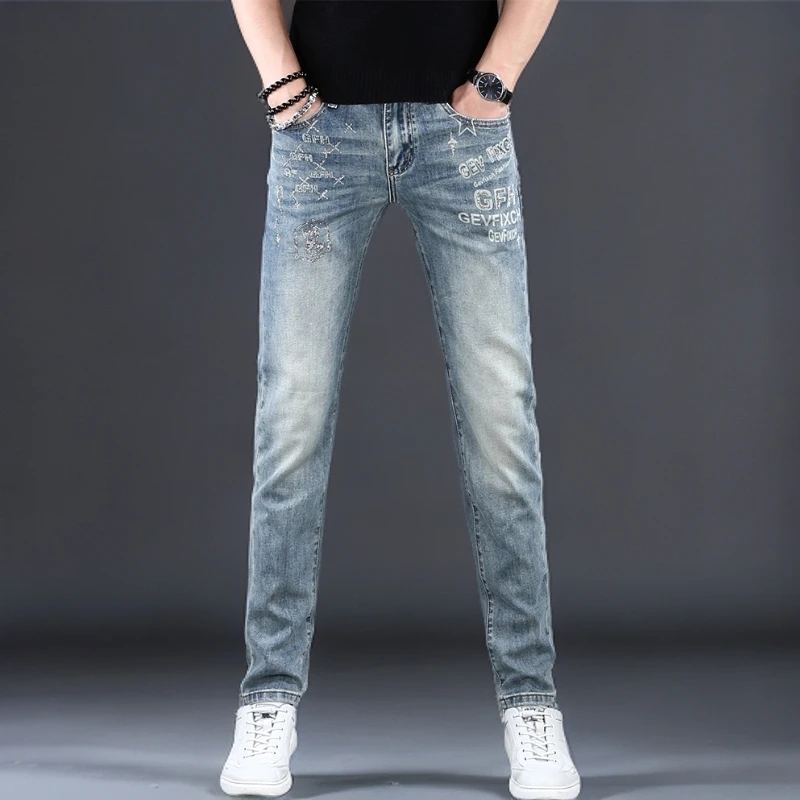 男士潮牌痞帅炸街男春秋季爆款时尚烫钻弹力修身小脚百搭牛仔裤男