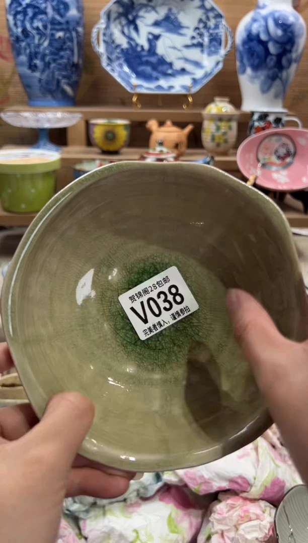 瓷片腼****?     V038