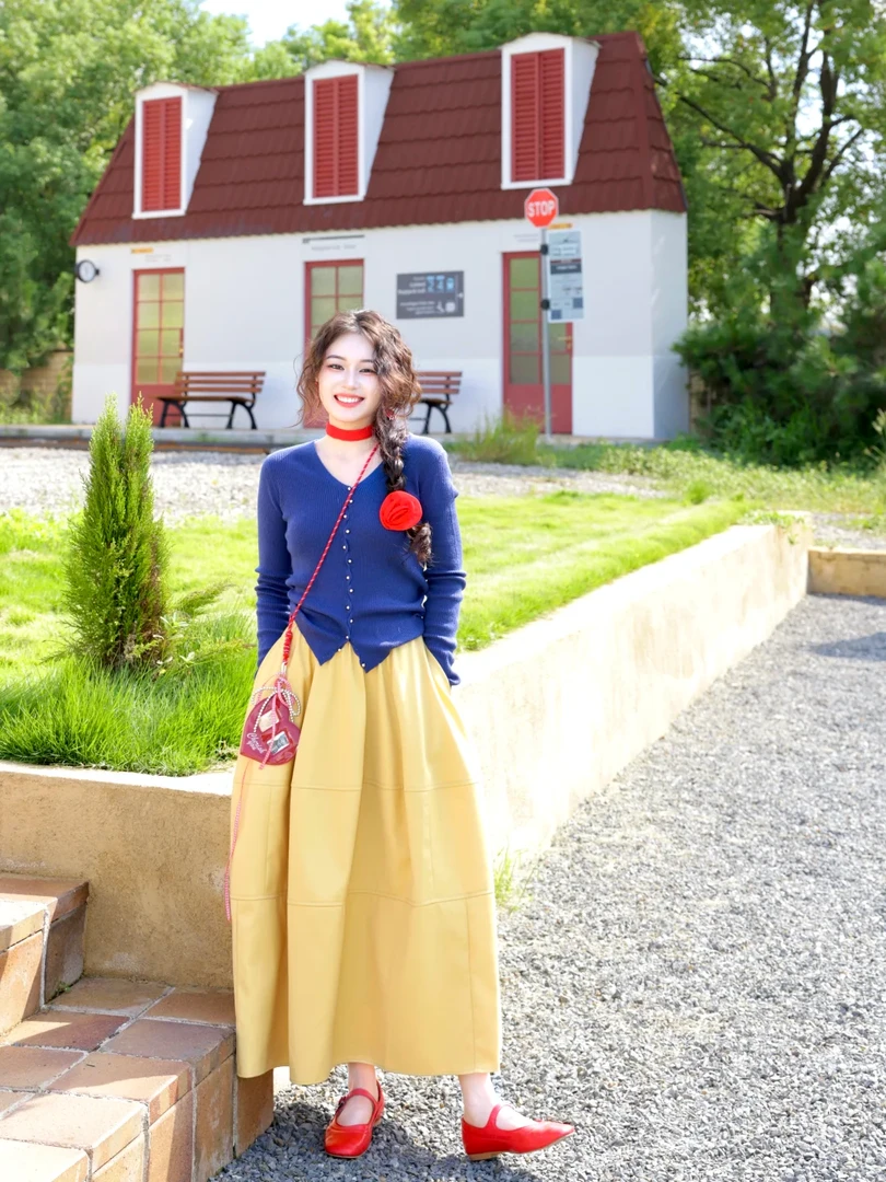 早秋穿搭一整套女2025新款不规则门边v领针织衫高腰半身裙套装女