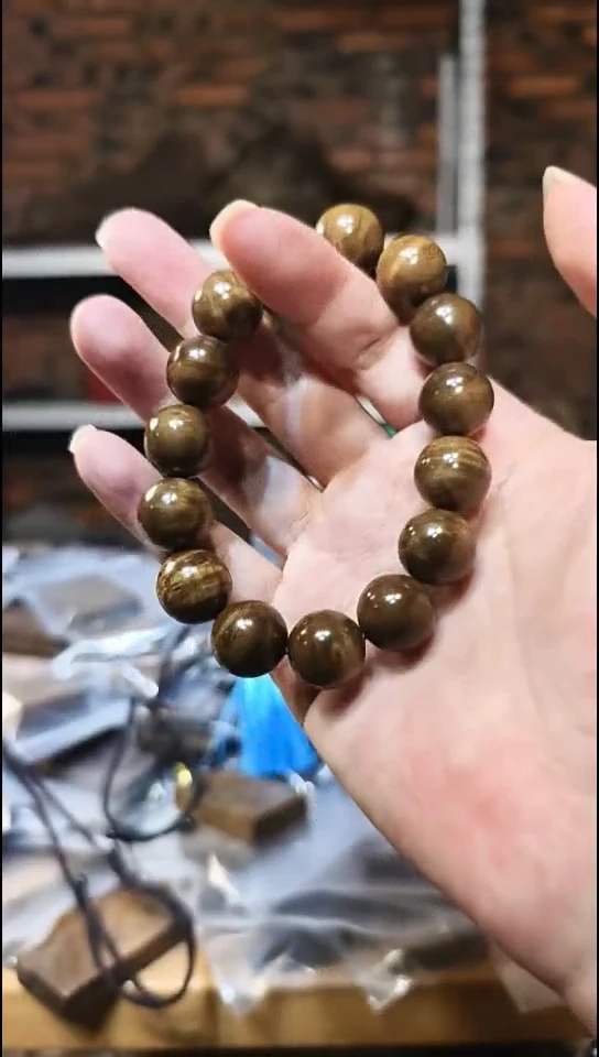 金丝楠༺****༻1.5阴沉黄黑金单圈