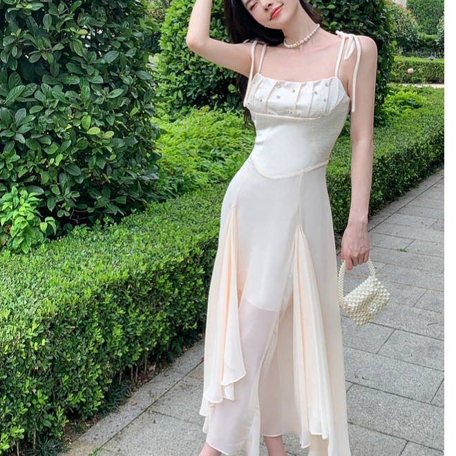 高级感水钻网纱拼接吊带连衣裙女2024夏新款性感收腰显瘦大摆长裙