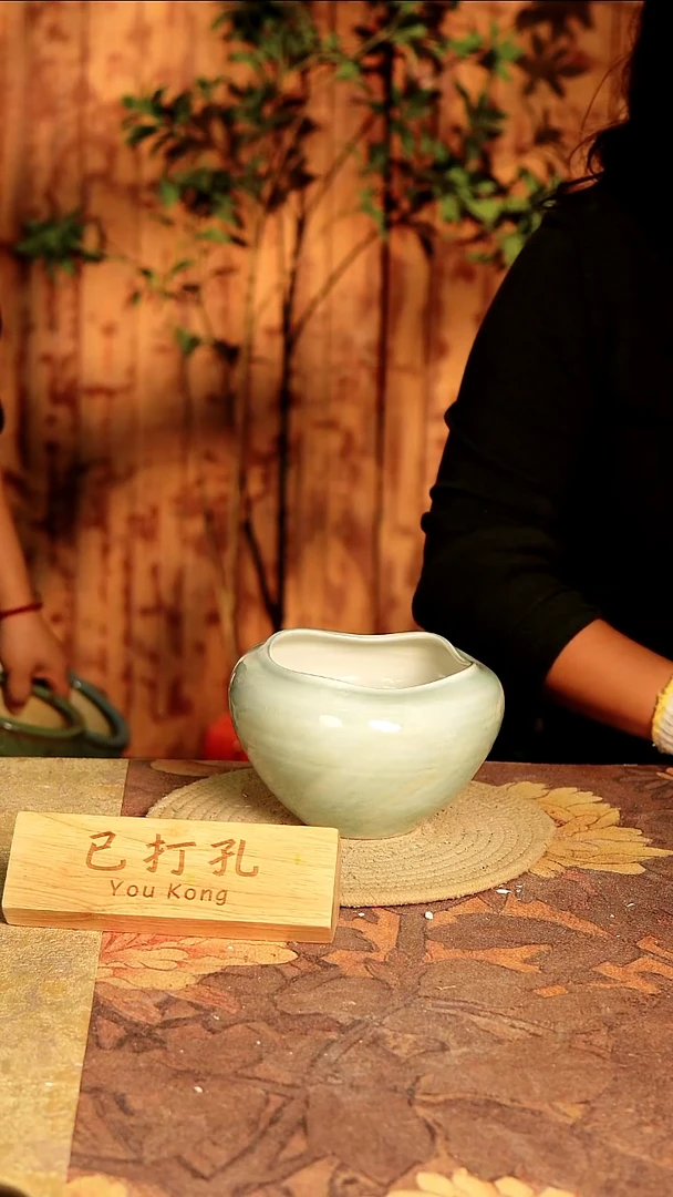 陶14-173高度10口径11已打孔