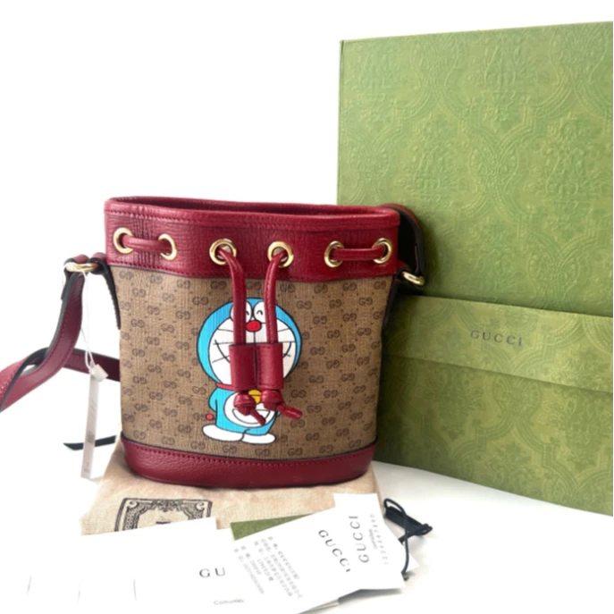 95新 GUCCI/古驰 安洁利严选哆啦A梦水桶包WH606003