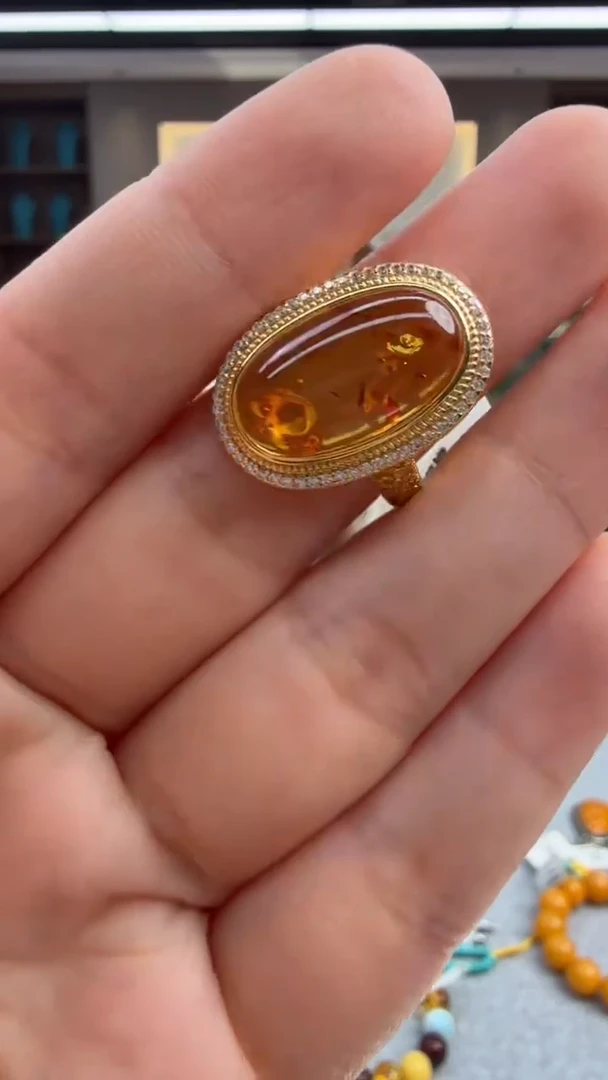 未镶嵌琥珀戒指256秒拍号 假一罚三