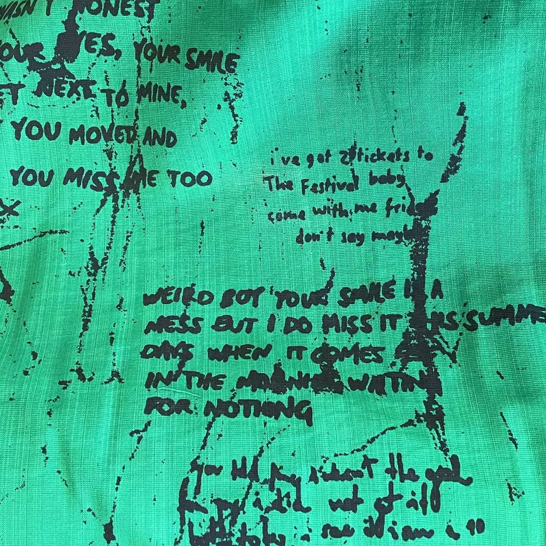 绿底字母花竹节棉时装时尚面料（不支持7天无理由）