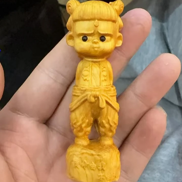 崖柏哪吒手把件一个