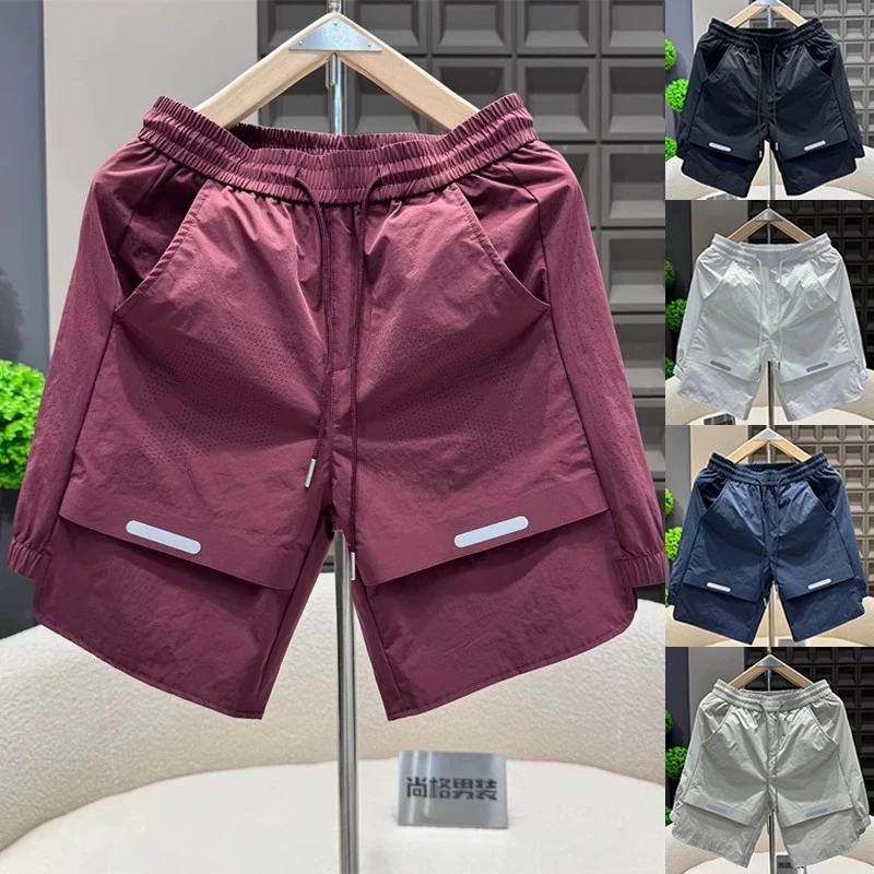 2025夏季男士薄款速干休闲潮流短裤激光打孔设计感冰丝运动五分裤