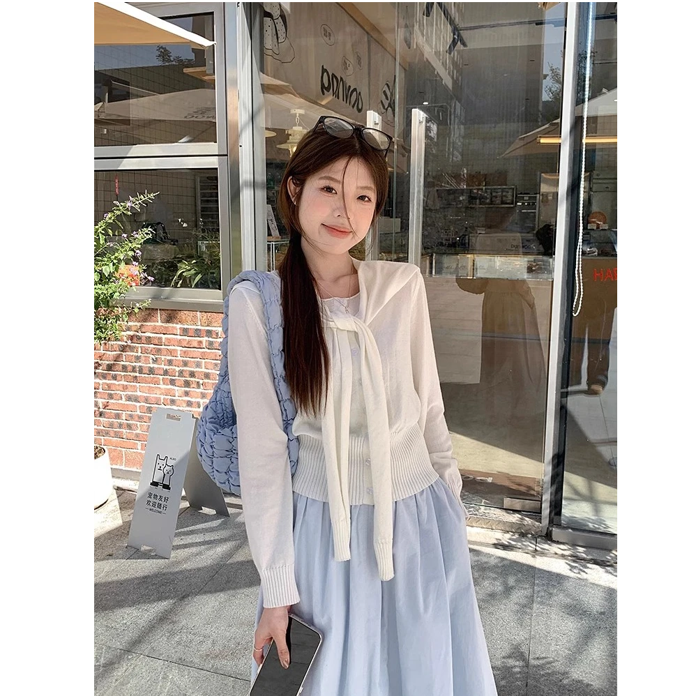 乌77早春韩系氛围感针织套装女外搭披肩圆领单排扣针织开衫两件套