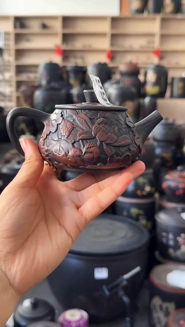 罐瑕疵壶满雕荷花 990