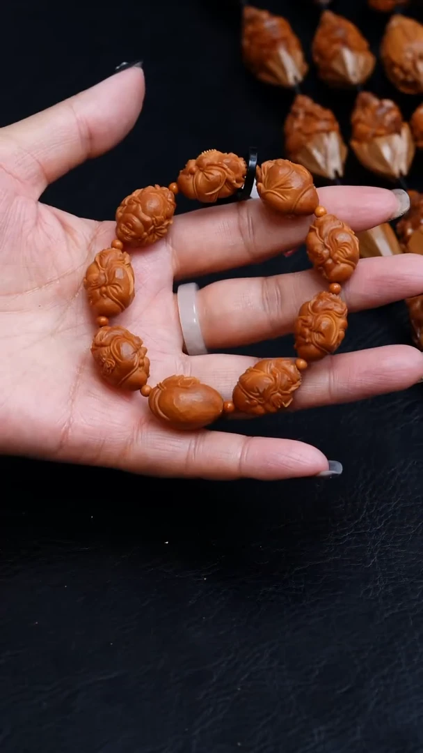 橄榄核吊坠味*16刀痕八宝弥勒