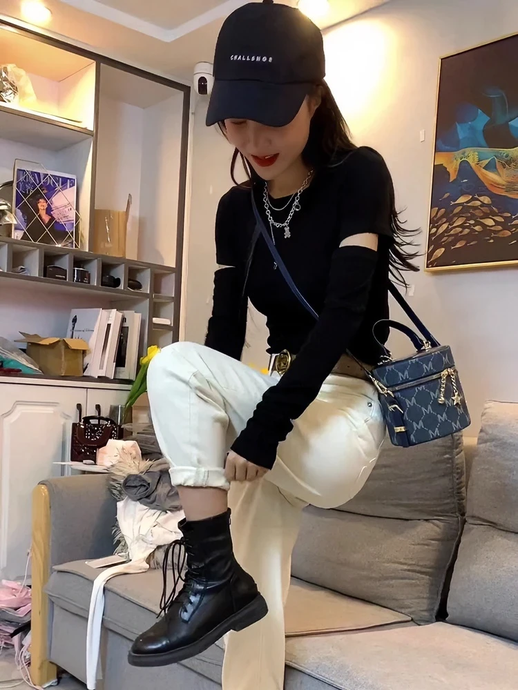 正肩时髦破洞镂空黑色长袖t恤女春秋内搭韩范短款修身收腰打底衫
