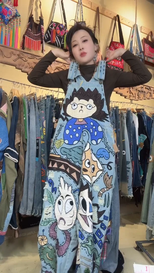 寨*牛仔裤