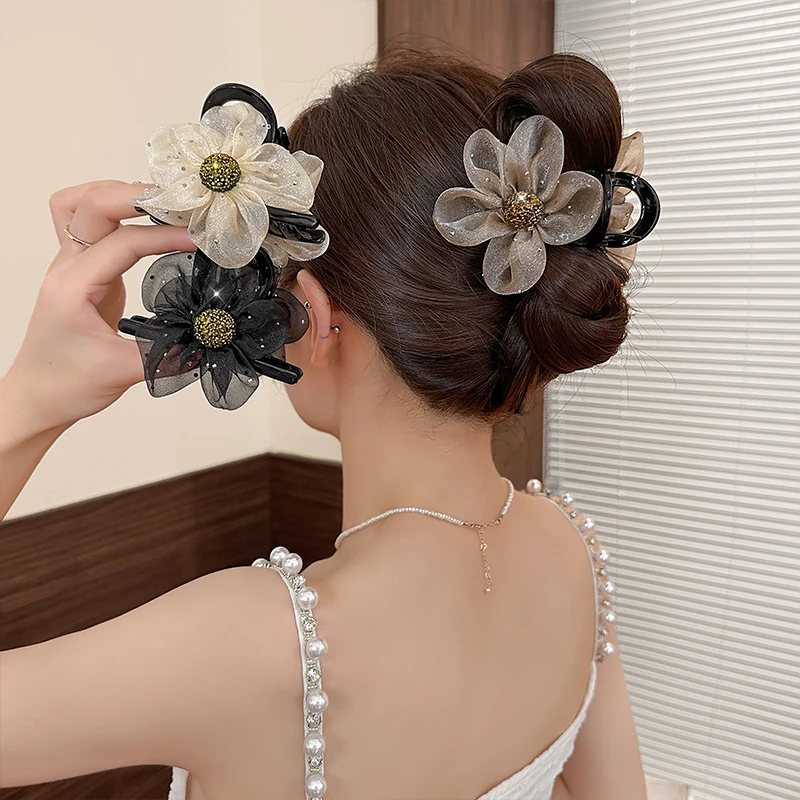 戴宁曼太阳花水钻花朵抓夹新款气质鲨鱼夹发夹女后脑勺夹子发饰