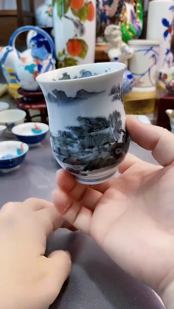 瓷片田万内外绘杯