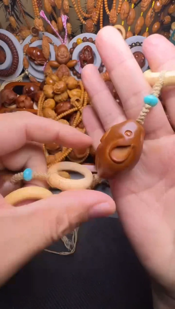 手串橄榄核数钱一个