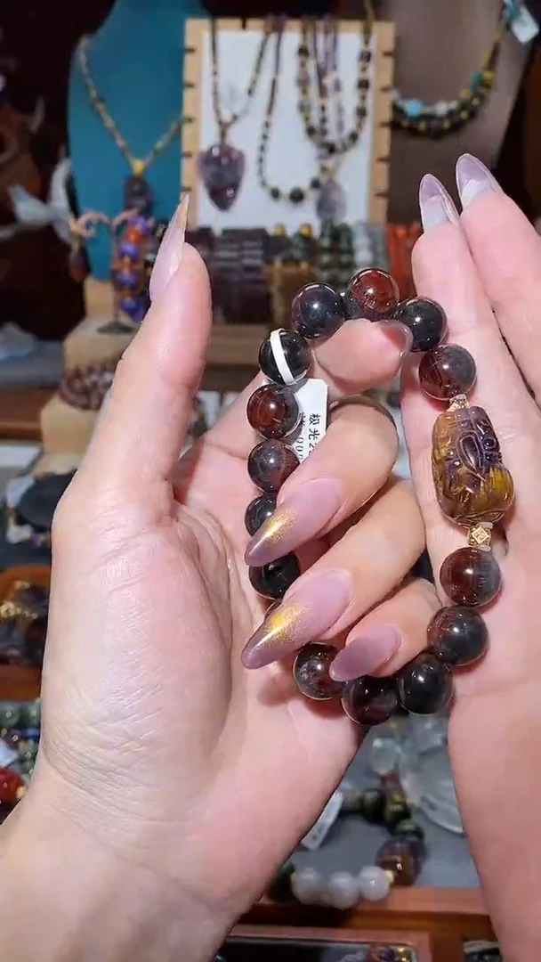 手串18K金镶嵌水晶极光八卦眼紫钛貔貅