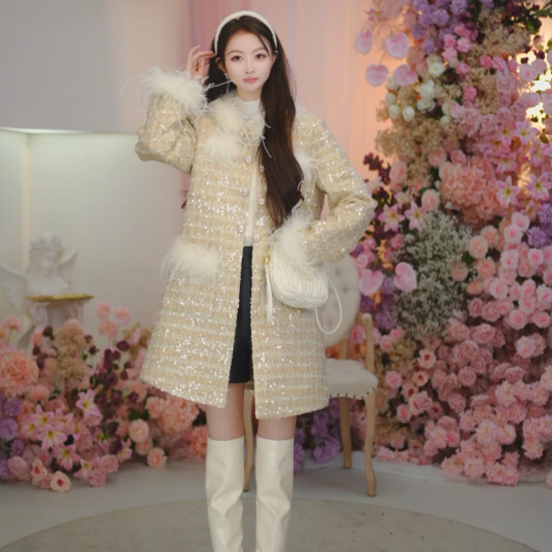 EVA OUXIU/伊华欧秀鸵鸟毛时尚名媛小香风羽绒服外套45WLS5819