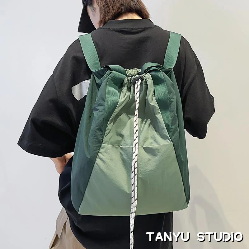 探屿轻便运动双肩包女抽绳束口袋多用手提斜挎包旅行背包学生书包