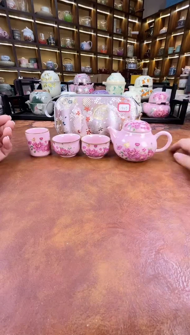 瓷片粉色梨形手把壶旅行