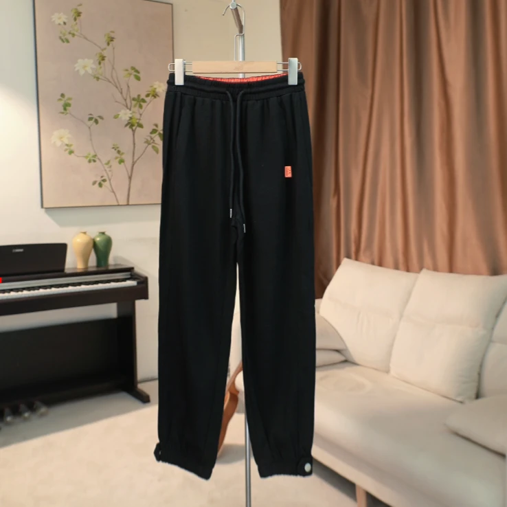 Y052 时尚百搭垂感纯黑休闲束脚裤女 EW21Q2309C