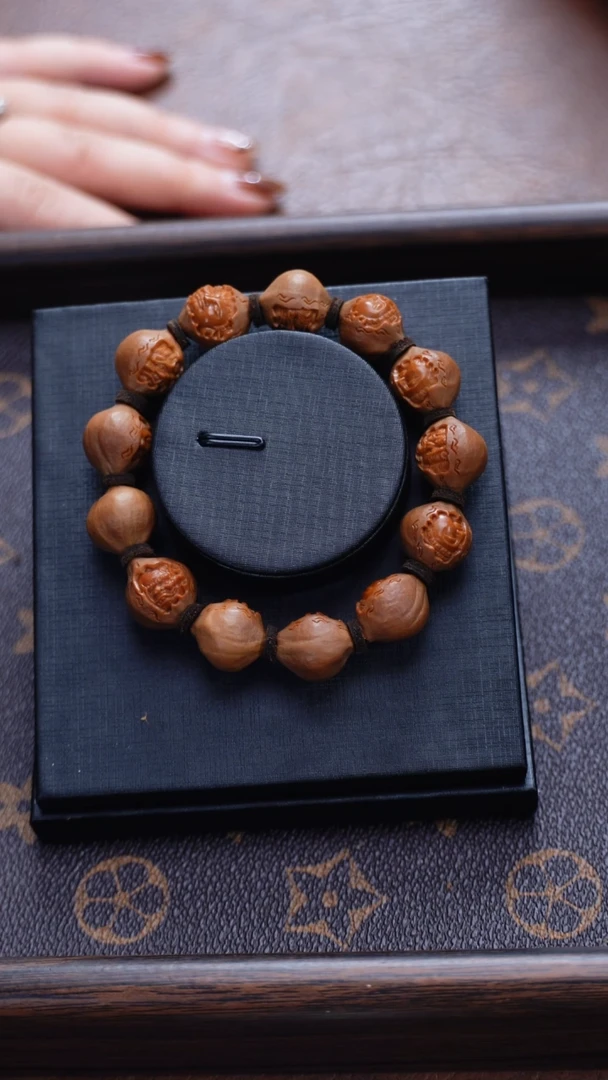 手串橄榄核我****我苏工橄榄核