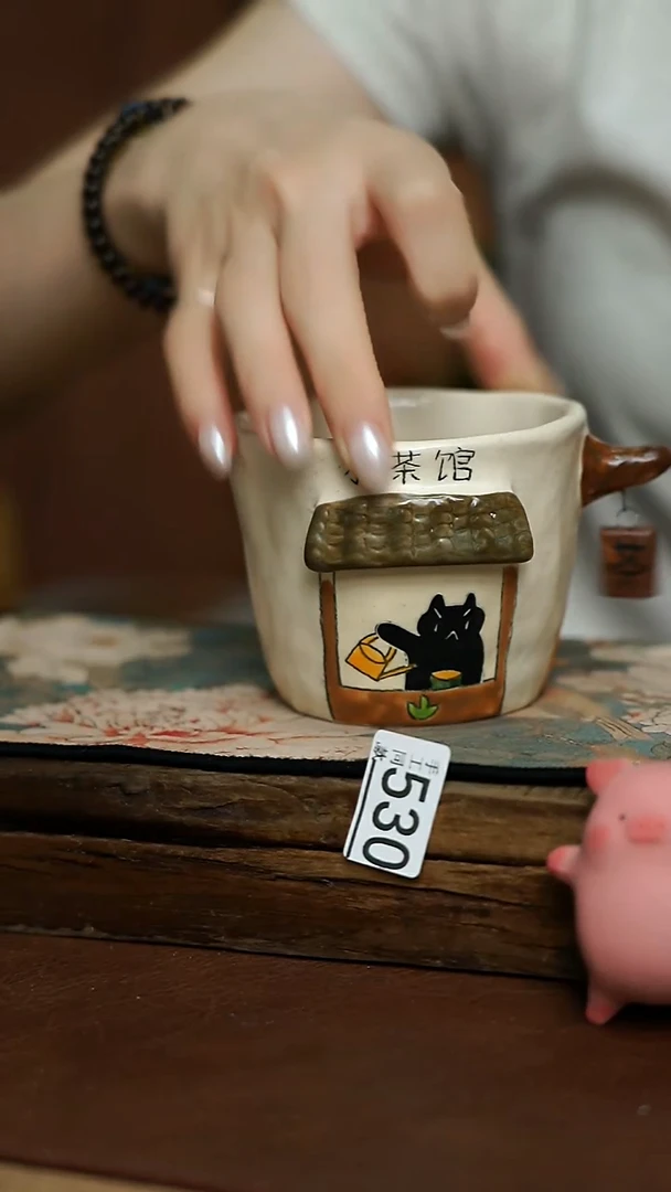 喵喵设计师 手握