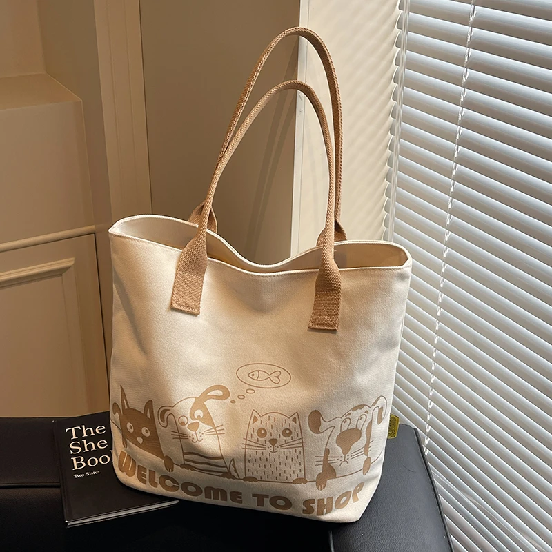 帆布包女2025新款大容量夏天上班通勤托特包大学生上课拎书单肩包