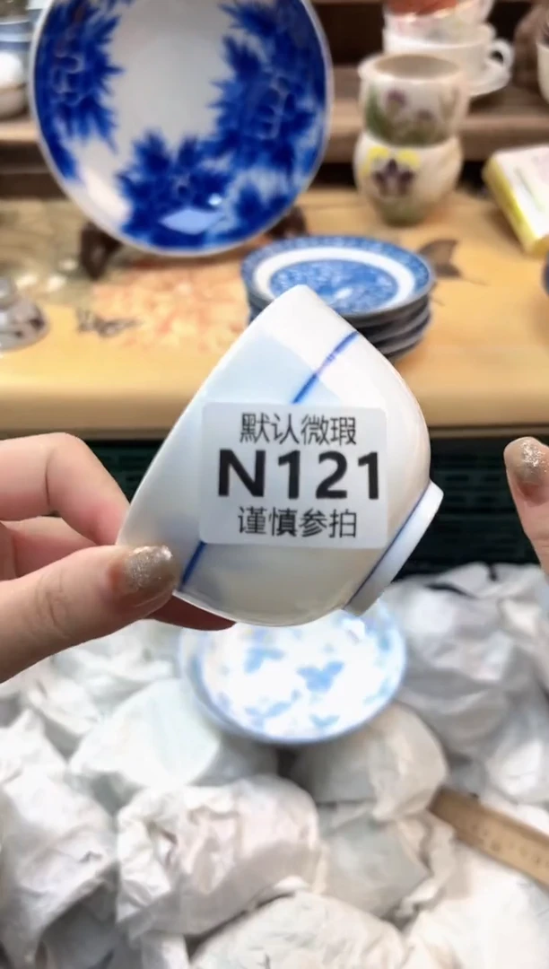 瓷片?**F 121