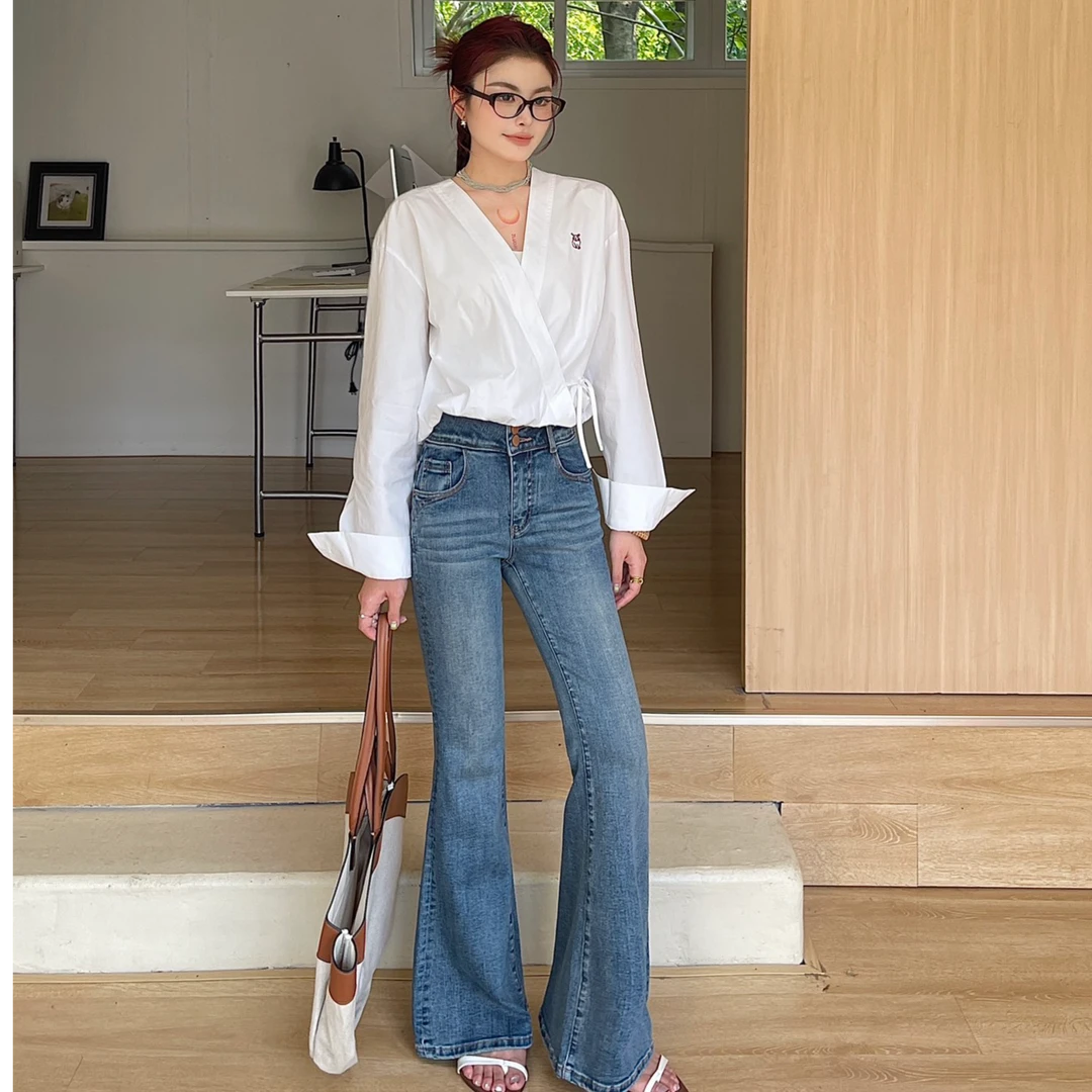 质社春季新款百搭显瘦弹力三粒扣嗽叭牛仔裤E327